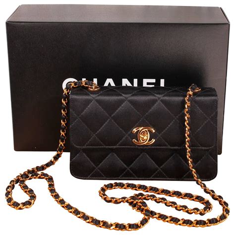 vintage black chanel clutch|Chanel vintage clutch.